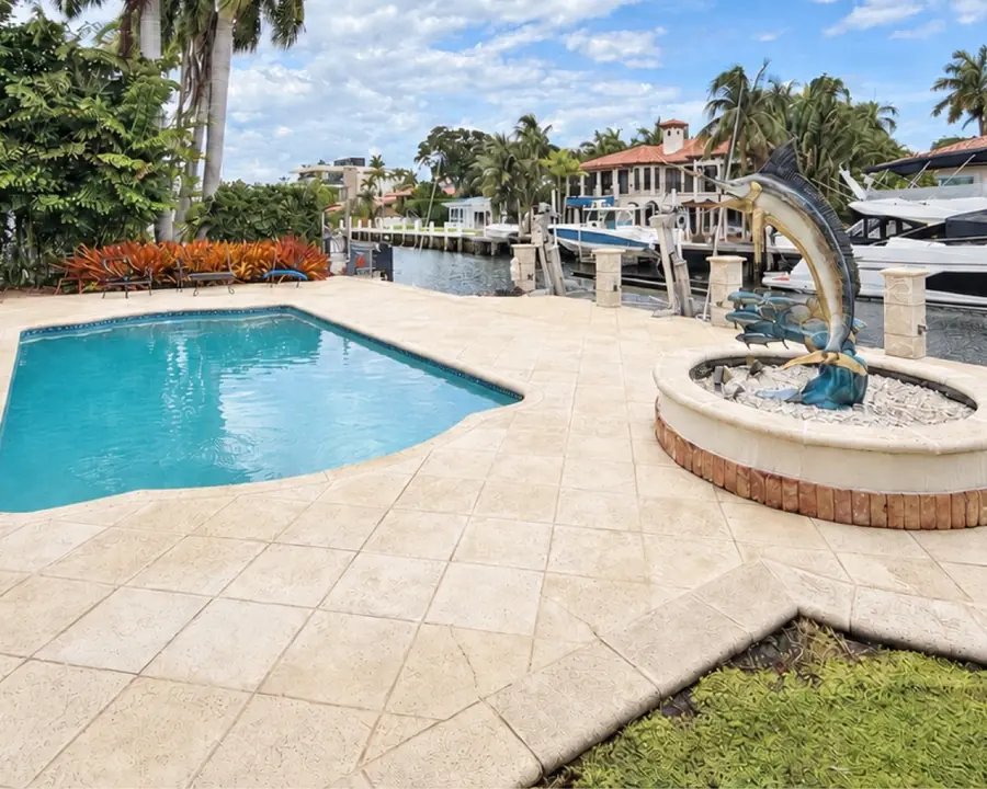 Freshly cleaned pool deck on a South Florida waterfront home
